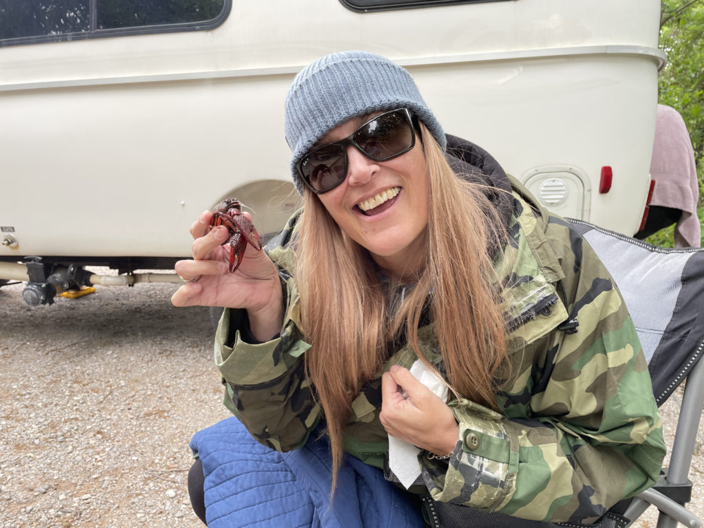 Boiling some crayfish from our neighbor while camping.