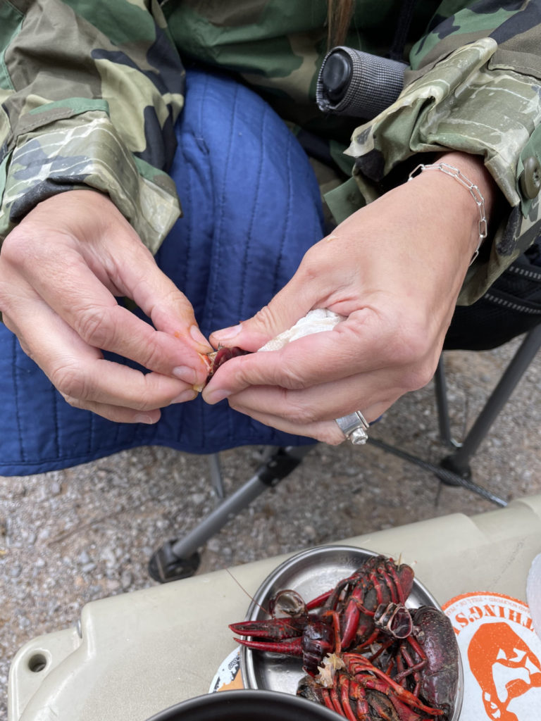 Boiling some crayfish from our neighbor while camping.