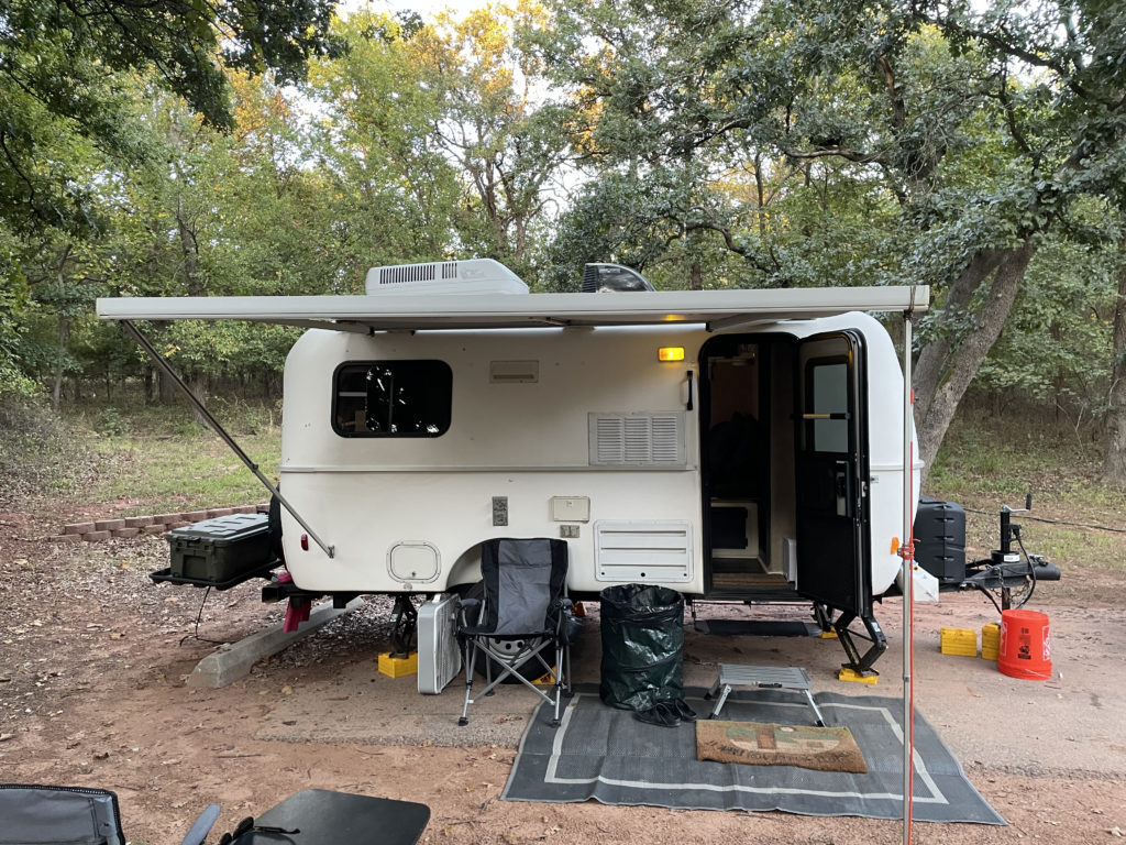 Uneven awning configuration on Casita trailer. This allows the door to open.